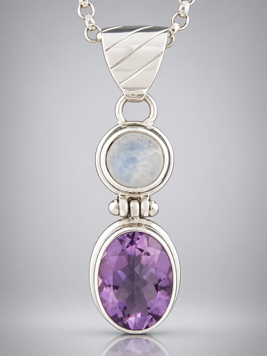 Faceted Amethyst Pendant with moonstone