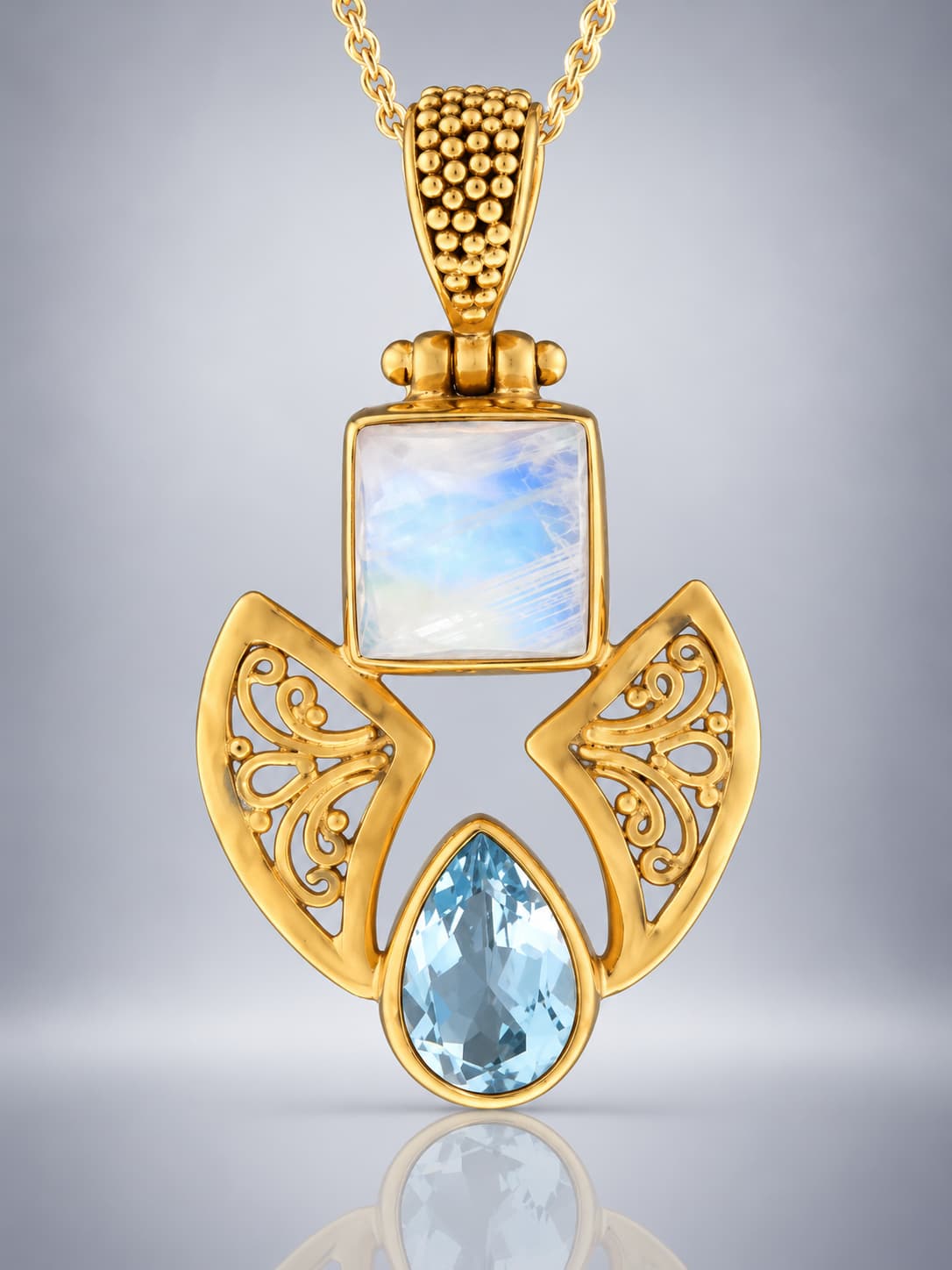 Blue Topaz and moonstone Gold Vermeil pendant