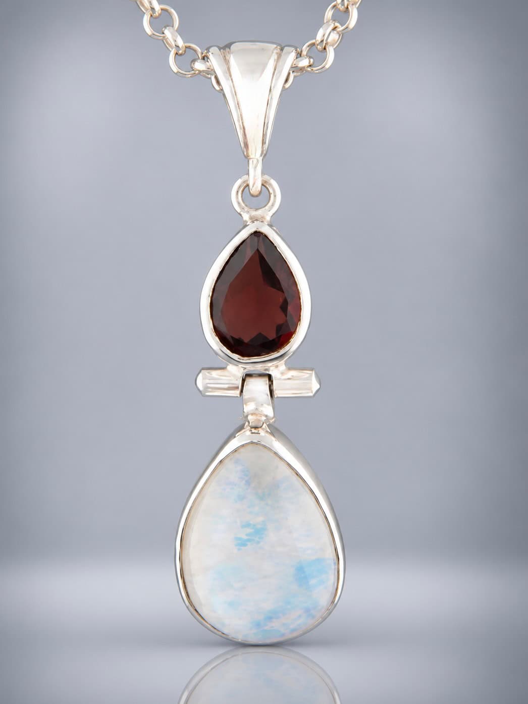 Garnet and moonstone sterling silver pendant