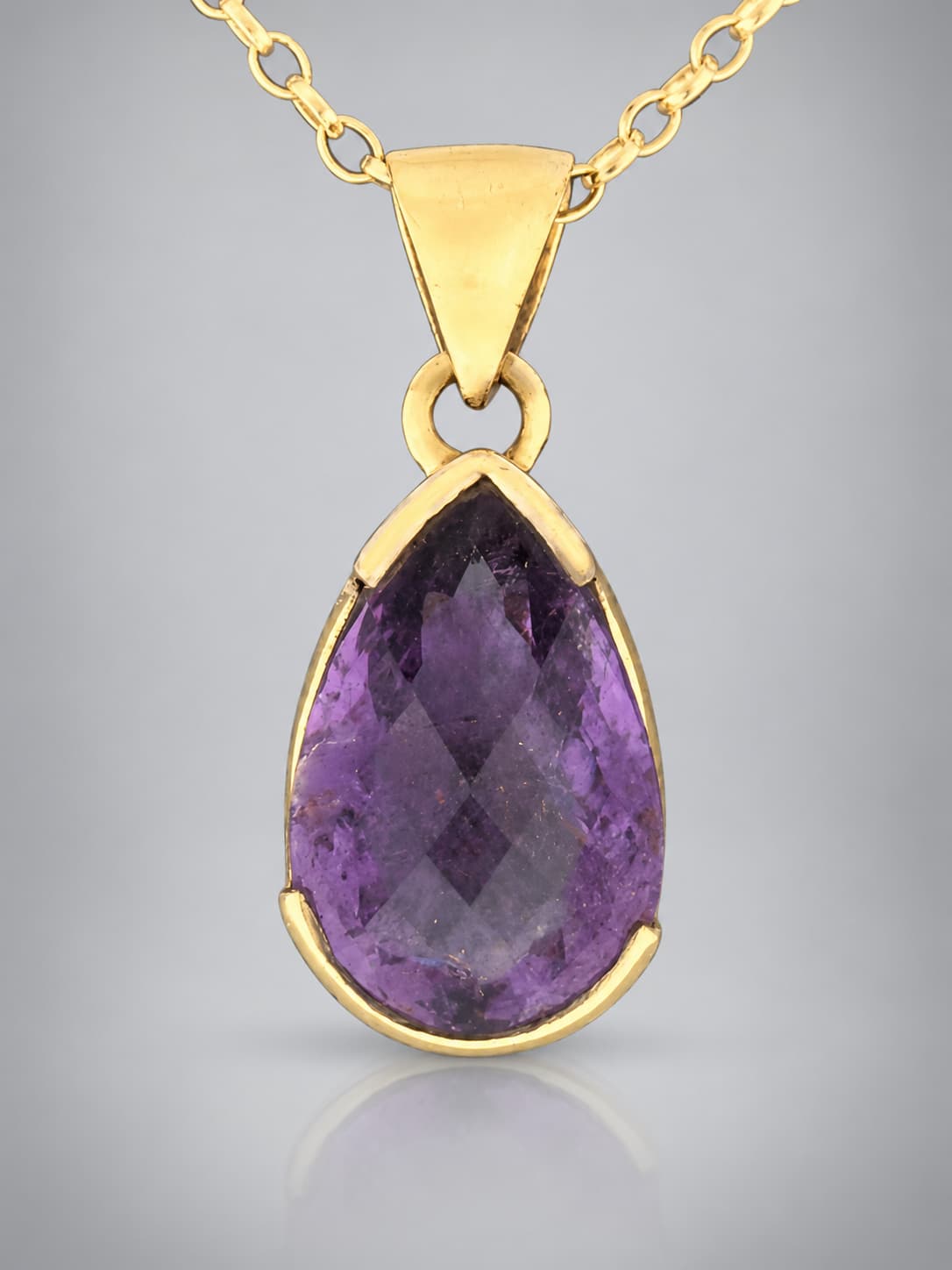 Elegant teardrop amethyst pendant in gold vermeil on chain.