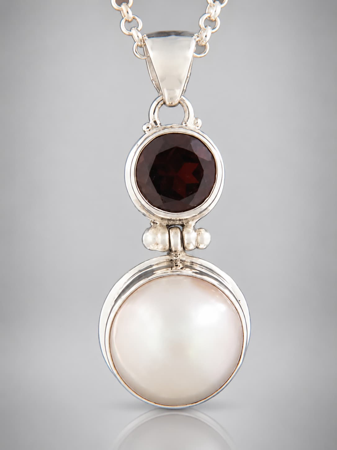 Garnet and pearl sterling silver pendant