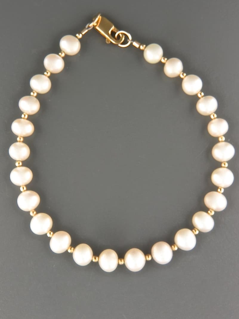 6mm white Pearl Bracelet with 2mm round beads