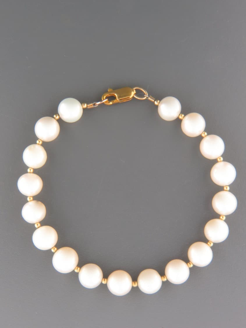 8mm white Pearl Bracelet with 2mm round beads