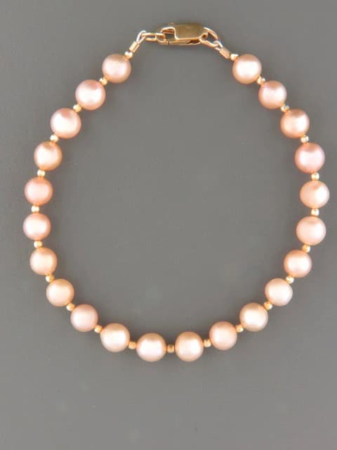 6mm pink pearl bracelet with round gold beads