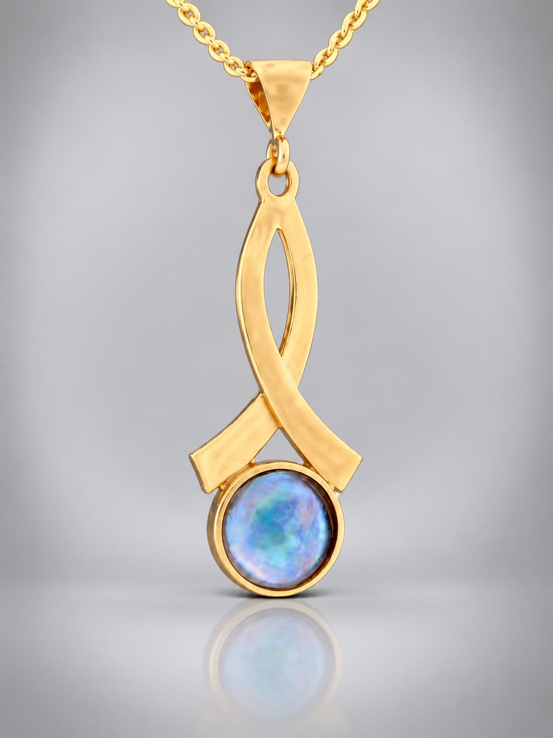 Blue pearl pendant with gold vermeil and 8mm pearl on a chain.