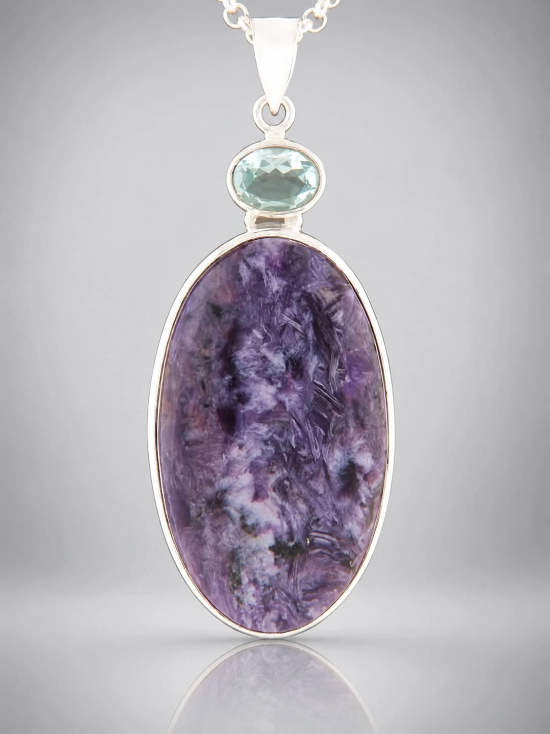 Charoite and bple topaz sterling silver pendant