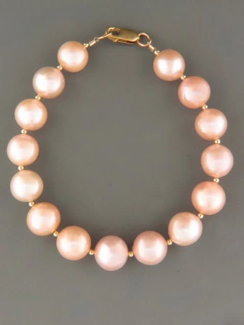 11mm Pink Pearl Bracelet with Gold beads