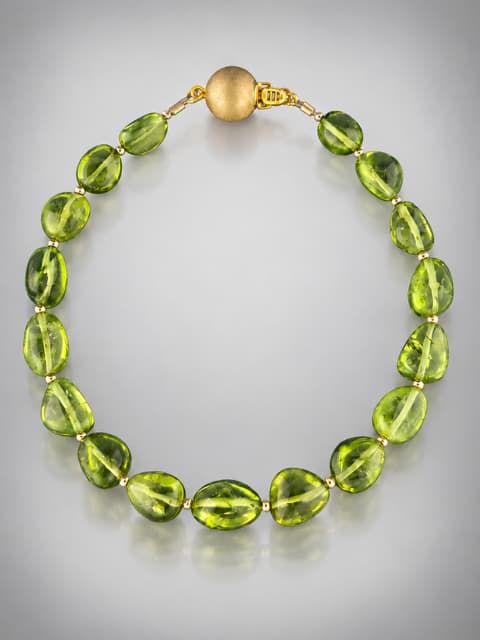 Peridot Bracelet with Gold beads - P950
