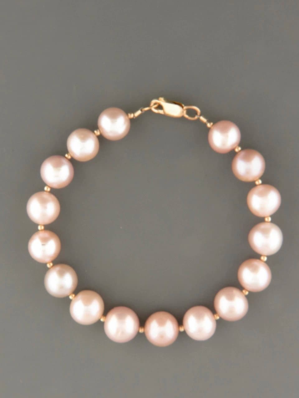 10mm Pink Pearl Bracelet with Gold beads