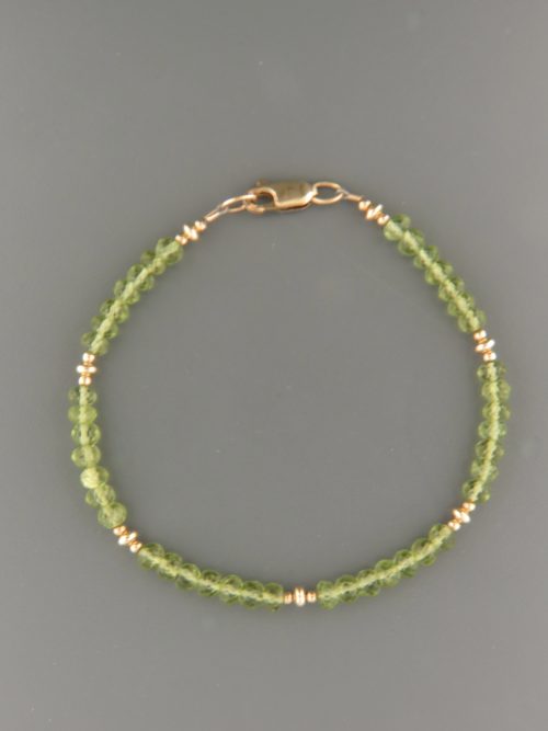 Peridot Bracelet - 4mm faceted roundels with Gold beads - P942